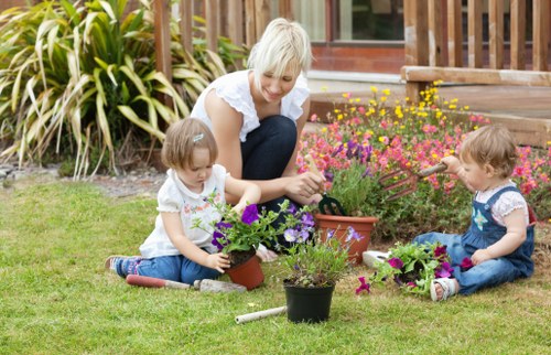 Professional turf preparation for artificial grass installation in Chessington