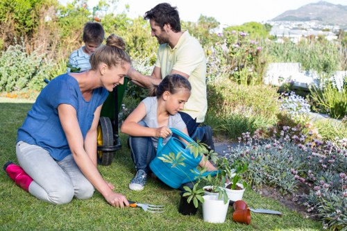 Local landscaping team planning a Chessington garden layout